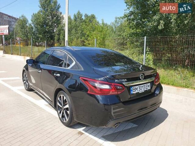 Черный Ниссан Альтима, объемом двигателя 2.49 л и пробегом 68 тыс. км за 13200 $, фото 5 на Automoto.ua