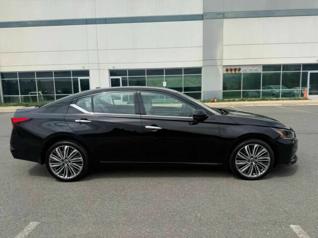 Черный Ниссан Альтима, объемом двигателя 2.5 л и пробегом 21 тыс. км за 10000 $, фото 6 на Automoto.ua