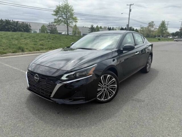 Черный Ниссан Альтима, объемом двигателя 2.5 л и пробегом 21 тыс. км за 10000 $, фото 2 на Automoto.ua