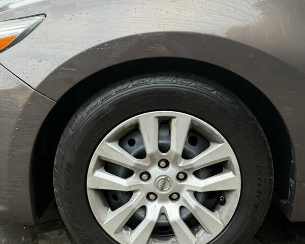Коричневий Ніссан Альтіма, об'ємом двигуна 2.49 л та пробігом 180 тис. км за 7990 $, фото 8 на Automoto.ua