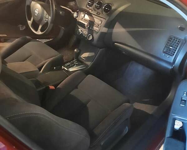 Красный Ниссан Альтима, объемом двигателя 2.5 л и пробегом 137 тыс. км за 8500 $, фото 1 на Automoto.ua