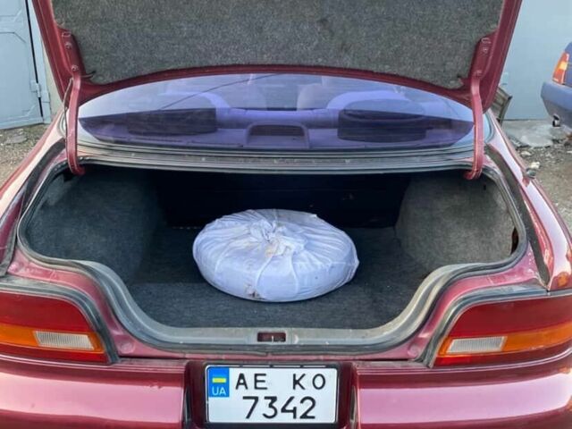 Красный Ниссан Альтима, объемом двигателя 2.4 л и пробегом 200 тыс. км за 1850 $, фото 9 на Automoto.ua