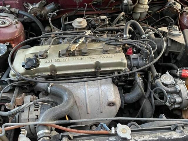 Красный Ниссан Альтима, объемом двигателя 2.4 л и пробегом 200 тыс. км за 1850 $, фото 8 на Automoto.ua