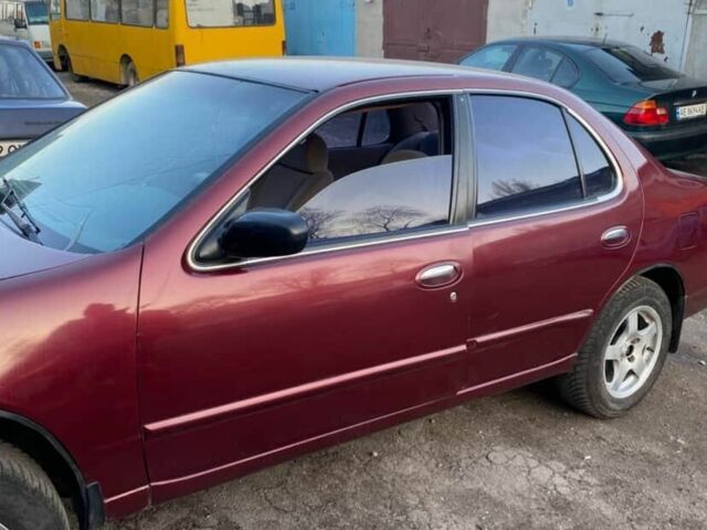 Красный Ниссан Альтима, объемом двигателя 2.4 л и пробегом 200 тыс. км за 1850 $, фото 11 на Automoto.ua