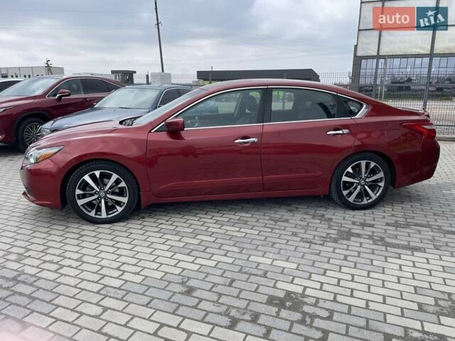 Красный Ниссан Альтима, объемом двигателя 2.49 л и пробегом 170 тыс. км за 8800 $, фото 4 на Automoto.ua