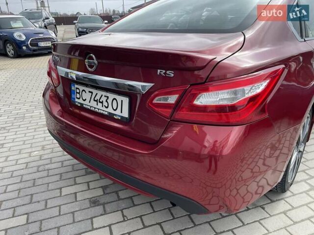 Красный Ниссан Альтима, объемом двигателя 2.49 л и пробегом 170 тыс. км за 8800 $, фото 7 на Automoto.ua
