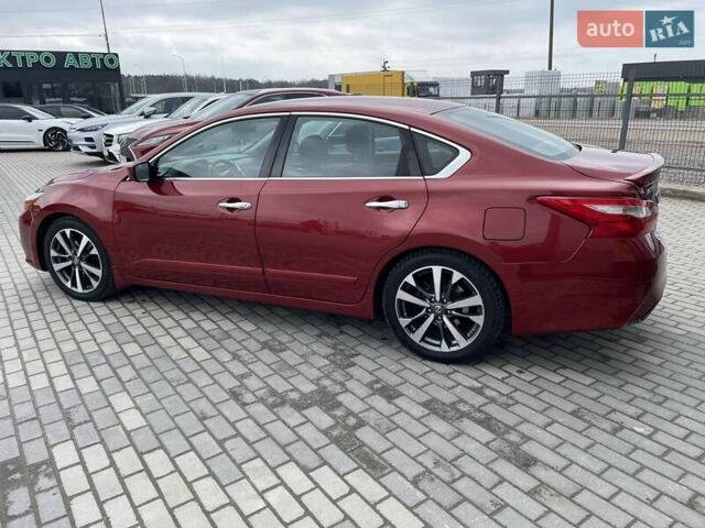 Красный Ниссан Альтима, объемом двигателя 2.49 л и пробегом 170 тыс. км за 8800 $, фото 3 на Automoto.ua