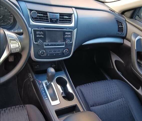 Червоний Ніссан Альтіма, об'ємом двигуна 2.49 л та пробігом 166 тис. км за 9300 $, фото 1 на Automoto.ua