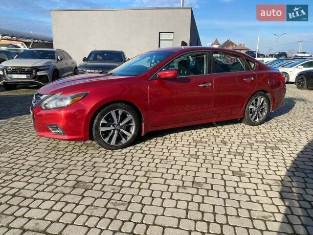 Червоний Ніссан Альтіма, об'ємом двигуна 2.49 л та пробігом 183 тис. км за 8900 $, фото 3 на Automoto.ua