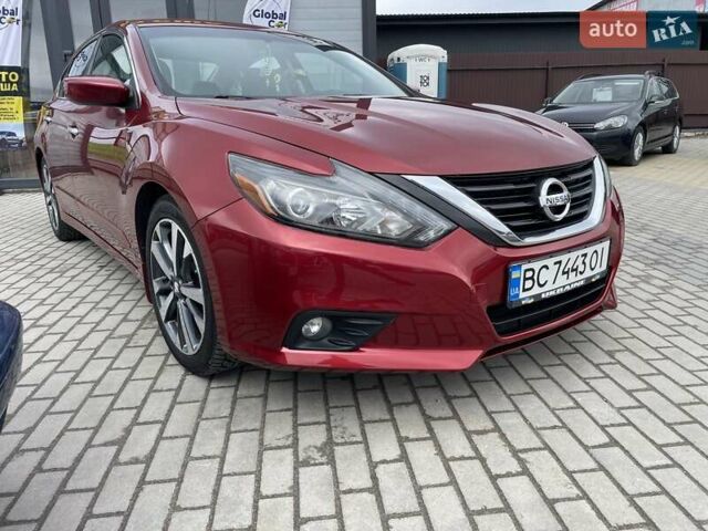 Красный Ниссан Альтима, объемом двигателя 2.49 л и пробегом 170 тыс. км за 8800 $, фото 2 на Automoto.ua