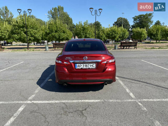 Червоний Ніссан Альтіма, об'ємом двигуна 2.49 л та пробігом 151 тис. км за 11400 $, фото 5 на Automoto.ua