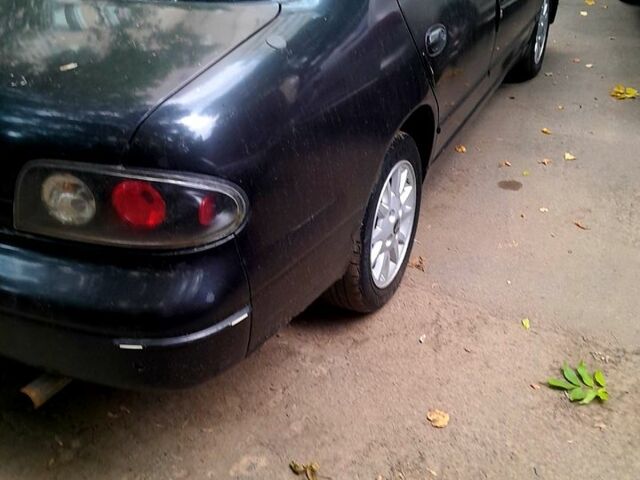 Сірий Ніссан Альтіма, об'ємом двигуна 2.4 л та пробігом 240 тис. км за 1100 $, фото 5 на Automoto.ua