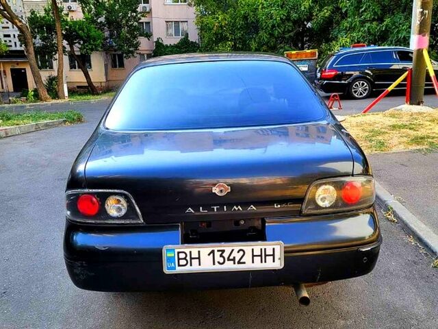 Серый Ниссан Альтима, объемом двигателя 2.4 л и пробегом 240 тыс. км за 1500 $, фото 6 на Automoto.ua