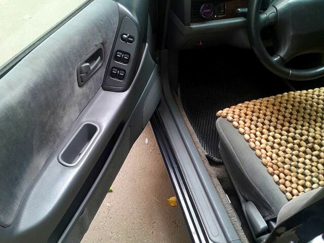 Сірий Ніссан Альтіма, об'ємом двигуна 2.4 л та пробігом 240 тис. км за 1100 $, фото 4 на Automoto.ua