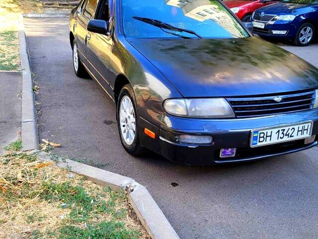 Серый Ниссан Альтима, объемом двигателя 2.4 л и пробегом 240 тыс. км за 1500 $, фото 5 на Automoto.ua