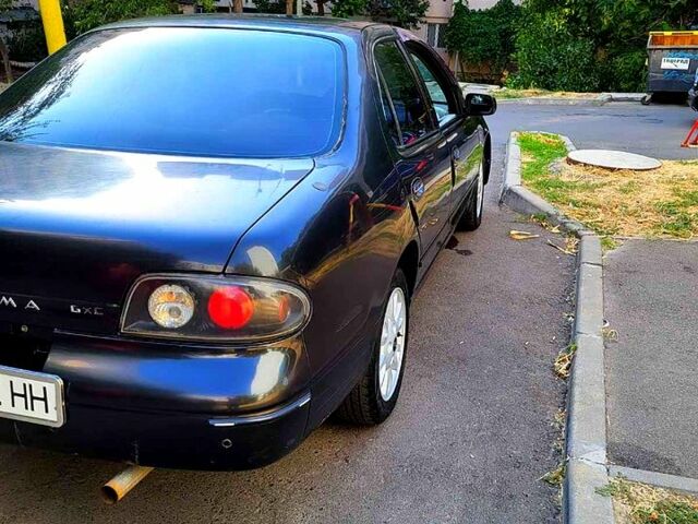 Серый Ниссан Альтима, объемом двигателя 2.4 л и пробегом 240 тыс. км за 1500 $, фото 3 на Automoto.ua