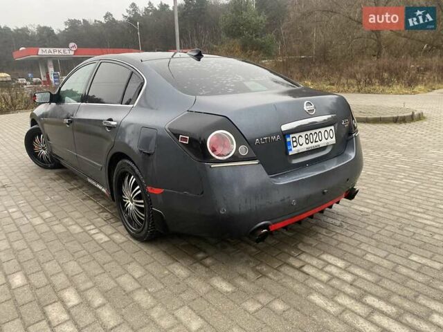 Серый Ниссан Альтима, объемом двигателя 2.49 л и пробегом 240 тыс. км за 4500 $, фото 7 на Automoto.ua