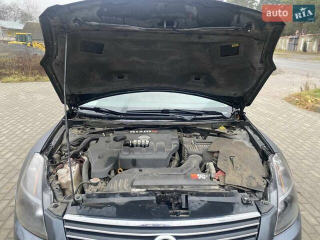 Серый Ниссан Альтима, объемом двигателя 2.49 л и пробегом 240 тыс. км за 4500 $, фото 64 на Automoto.ua