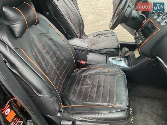 Серый Ниссан Альтима, объемом двигателя 2.49 л и пробегом 240 тыс. км за 4500 $, фото 48 на Automoto.ua