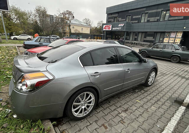 Серый Ниссан Альтима, объемом двигателя 2.5 л и пробегом 229 тыс. км за 6400 $, фото 4 на Automoto.ua