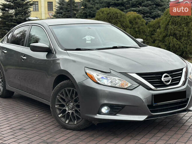Серый Ниссан Альтима, объемом двигателя 2.49 л и пробегом 256 тыс. км за 9999 $, фото 6 на Automoto.ua