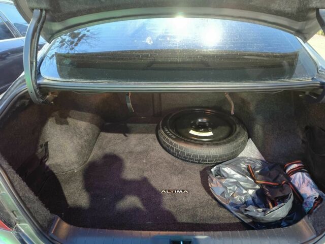 Серый Ниссан Альтима, объемом двигателя 2.5 л и пробегом 230 тыс. км за 9499 $, фото 10 на Automoto.ua