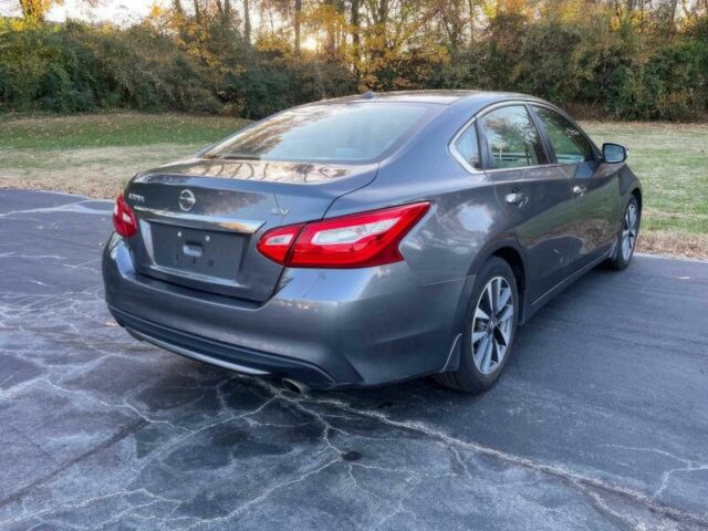 Серый Ниссан Альтима, объемом двигателя 2.5 л и пробегом 69 тыс. км за 9500 $, фото 5 на Automoto.ua