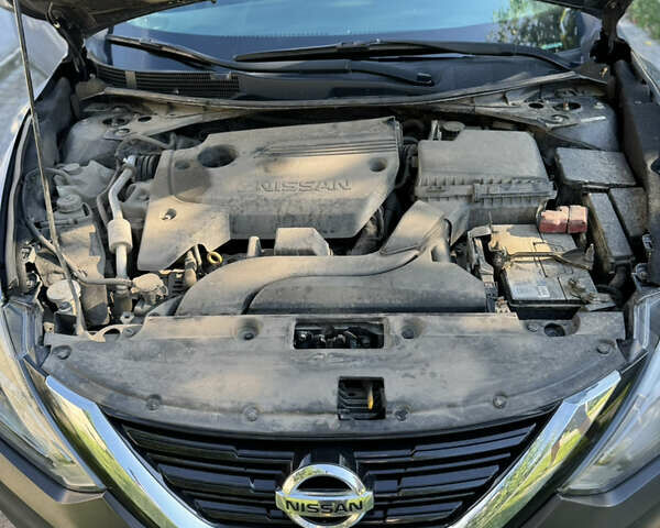 Серый Ниссан Альтима, объемом двигателя 2.49 л и пробегом 217 тыс. км за 11000 $, фото 16 на Automoto.ua