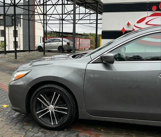 Серый Ниссан Альтима, объемом двигателя 2.5 л и пробегом 95 тыс. км за 12300 $, фото 2 на Automoto.ua