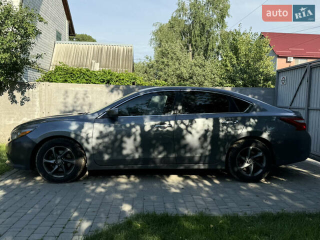 Серый Ниссан Альтима, объемом двигателя 2.49 л и пробегом 217 тыс. км за 11000 $, фото 5 на Automoto.ua