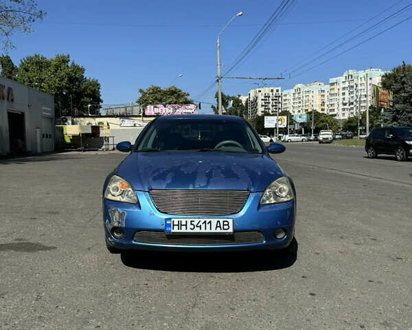 Синій Ніссан Альтіма, об'ємом двигуна 2.49 л та пробігом 160 тис. км за 2999 $, фото 6 на Automoto.ua