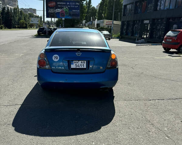Синій Ніссан Альтіма, об'ємом двигуна 2.49 л та пробігом 160 тис. км за 2999 $, фото 8 на Automoto.ua