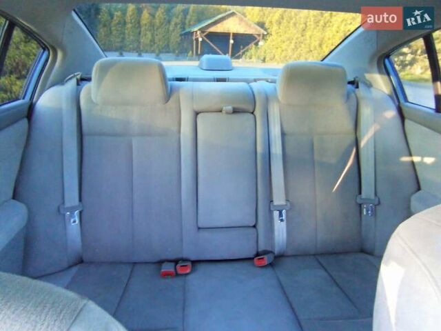 Синій Ніссан Альтіма, об'ємом двигуна 2.49 л та пробігом 156 тис. км за 6500 $, фото 4 на Automoto.ua