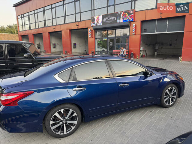 Синий Ниссан Альтима, объемом двигателя 2.49 л и пробегом 99 тыс. км за 11500 $, фото 11 на Automoto.ua