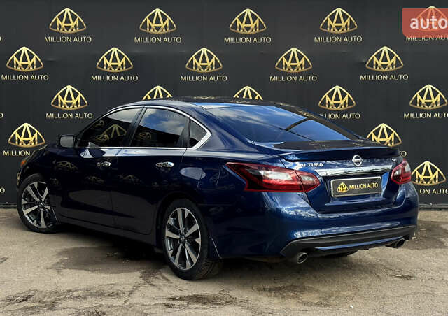 Синий Ниссан Альтима, объемом двигателя 2.49 л и пробегом 211 тыс. км за 10900 $, фото 3 на Automoto.ua