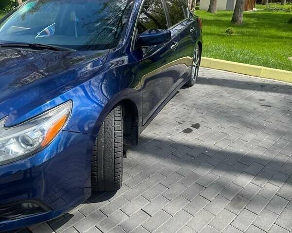 Синий Ниссан Альтима, объемом двигателя 2.49 л и пробегом 210 тыс. км за 10700 $, фото 4 на Automoto.ua