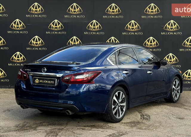 Синий Ниссан Альтима, объемом двигателя 2.49 л и пробегом 211 тыс. км за 10900 $, фото 5 на Automoto.ua