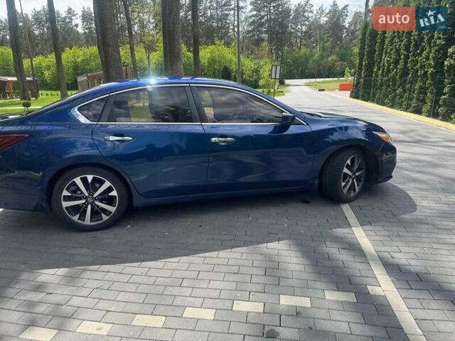 Синий Ниссан Альтима, объемом двигателя 2.49 л и пробегом 210 тыс. км за 10700 $, фото 2 на Automoto.ua