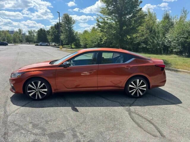 Помаранчевий Ніссан Альтіма, об'ємом двигуна 2.5 л та пробігом 40 тис. км за 8000 $, фото 3 на Automoto.ua