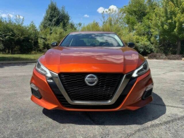 Помаранчевий Ніссан Альтіма, об'ємом двигуна 2.5 л та пробігом 40 тис. км за 8000 $, фото 1 на Automoto.ua