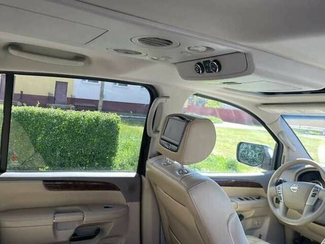 Белый Ниссан Армада, объемом двигателя 5.55 л и пробегом 245 тыс. км за 14500 $, фото 7 на Automoto.ua