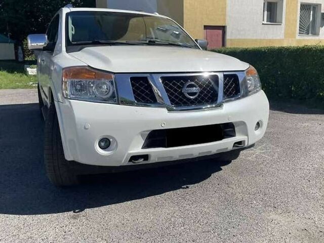 Белый Ниссан Армада, объемом двигателя 5.55 л и пробегом 245 тыс. км за 14500 $, фото 4 на Automoto.ua