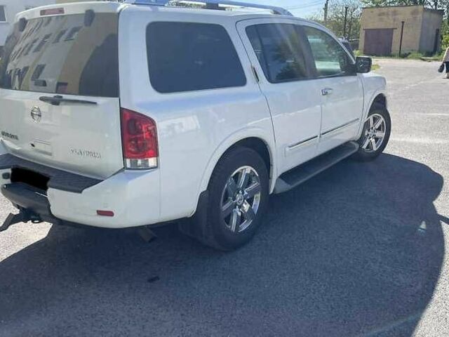 Белый Ниссан Армада, объемом двигателя 5.55 л и пробегом 245 тыс. км за 14500 $, фото 2 на Automoto.ua