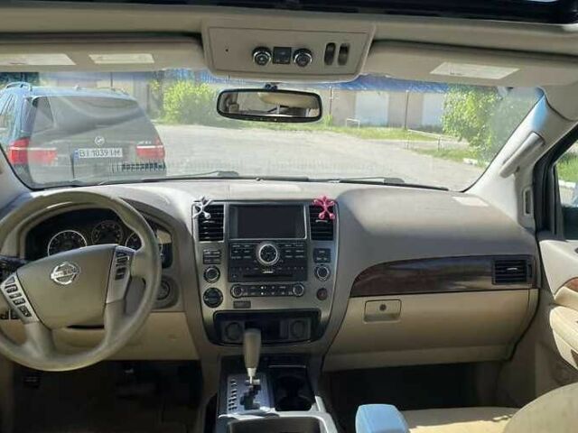 Белый Ниссан Армада, объемом двигателя 5.55 л и пробегом 245 тыс. км за 14500 $, фото 8 на Automoto.ua