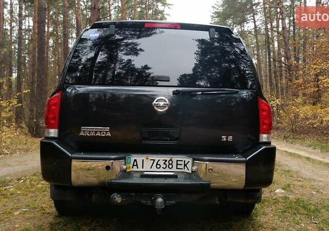 Черный Ниссан Армада, объемом двигателя 5.6 л и пробегом 240 тыс. км за 9200 $, фото 9 на Automoto.ua