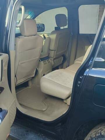 Черный Ниссан Армада, объемом двигателя 5.6 л и пробегом 300 тыс. км за 8500 $, фото 19 на Automoto.ua