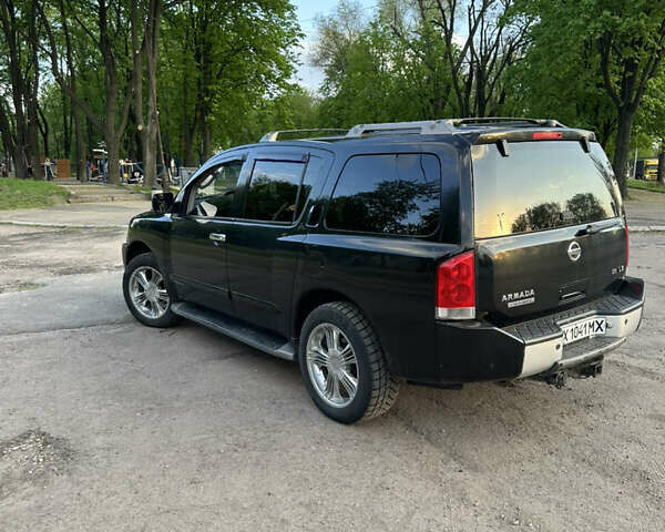 Черный Ниссан Армада, объемом двигателя 5.6 л и пробегом 322 тыс. км за 8000 $, фото 5 на Automoto.ua