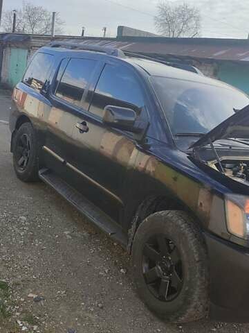 Черный Ниссан Армада, объемом двигателя 5.6 л и пробегом 300 тыс. км за 8500 $, фото 7 на Automoto.ua