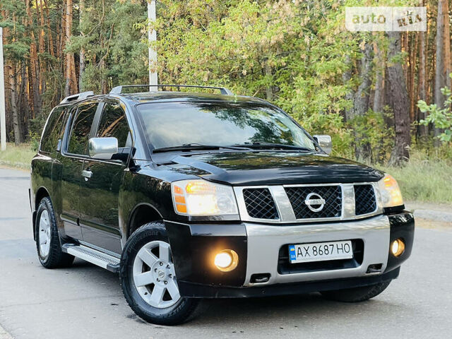 Чорний Ніссан Armada, об'ємом двигуна 5.6 л та пробігом 190 тис. км за 8999 $, фото 1 на Automoto.ua