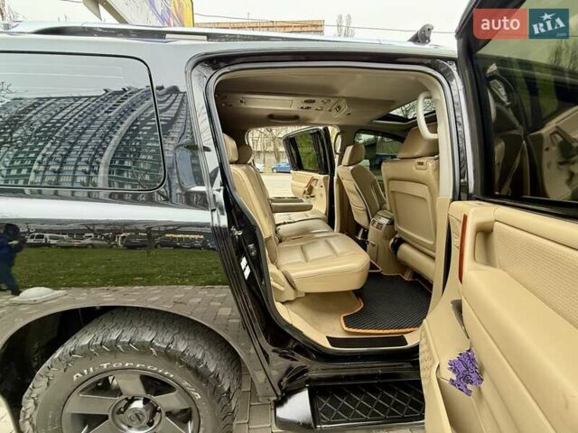 Черный Ниссан Армада, объемом двигателя 5.6 л и пробегом 267 тыс. км за 10999 $, фото 67 на Automoto.ua